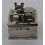 A George III silver travelling inkwell, of plain square form with screw cap hinged cover, London