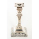 An Edwardian Neo-Classical style candlestick, detachable sconce, the base chased with swag tied