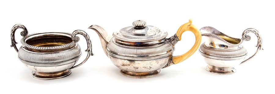 Paul Storr: A matched George IV silver tea set including teapot, sugar bowl and milk jug, the