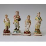 Four early nineteenth century pearlware square-based figures, circa 1820. Each is picked out in