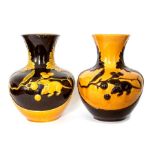Two Bretby Art Pottery Arts & Crafts baluster vases, moulded rat and fruit design, acanthus borders,