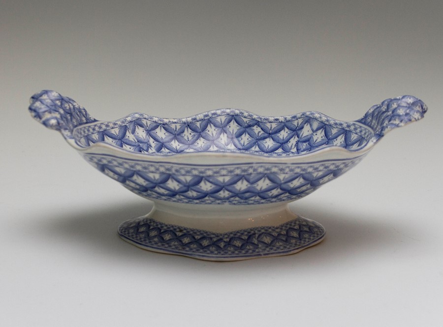 An early nineteenth century blue and white transfer printed Spode footed and handled large