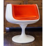 A 1960's laminated space chair with orange upholstery. Condition: Wear to fabric and marks to