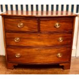 A 19th Century mahogany bow fronted chest of drawers, two short and three long drawers with brass