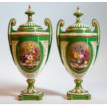 A pair of Royal Worcester vases and covers, Edwardian, on a green ground, central panel depicting