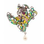 A silver plique a-jour enamel brooch/pendant in the form of a 1920's dancer, the head dress set with
