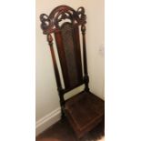 A 19th Century walnut Carolean style chair, carved floral top with cane work inlay splat, moulded