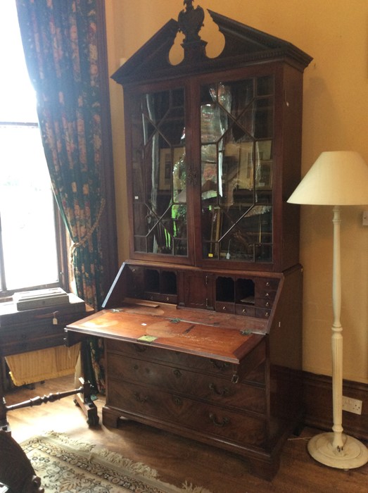 A George III mahogany glazed bookcase bureau, circa 1770, in the manner of Chippendale, crowned with - Image 2 of 2