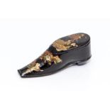 A mid 19th Century black lacquer shoe snuff box, chinoiserie decoration, hinged cover, width 8cm