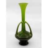 A Bretby Art Pottery Arts & Crafts triple handled trumpet vase, graduated green glaze, height 44cm