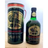 A bottle of 12 Year Old Bunnahabhain Single Islay Malt Scotch Whisky.  Region: Islay Distillery: