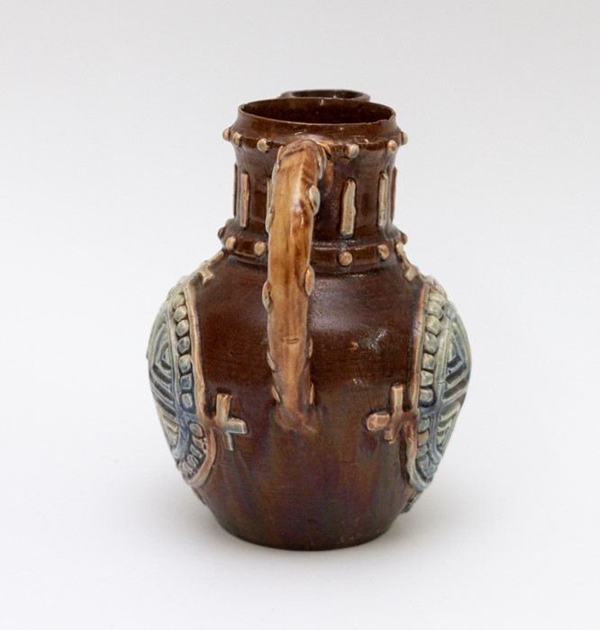 A late nineteenth century Castle Hedingham Pottery Art Pottery handle jug/teapot, circa 1880. It has - Image 4 of 5