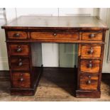 An early Victorian rosewood pedestal kneehole desk, circa 1840, rectangular top with leather writing