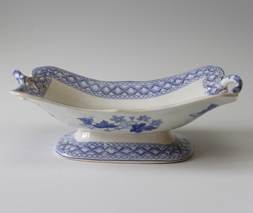 An early nineteenth century blue and white transfer printed Spode Geranium twin-handled footed