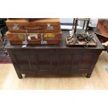 An early 18th Century oak four-panelled joined blanket chest, c.1720, the hinged lid opening to