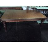 A late Victorian mahogany dining table, circa 1890, raised on turned legs, approx 72cm high, 173cm