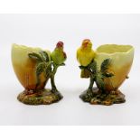 A pair of Bretby Art Pottery spill vases in the form of birds on branches, No.1184, height 12cm (