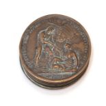 Napoleon Interest, a novelty cast metal pocket snuff box in the form a Napoleonic coin, screw top,