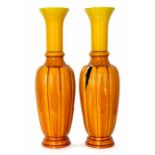 A pair of Bretby Art Pottery large vases of baluster shaped with reeded decoration and applied