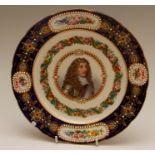 A mid-nineteenth century Sevres-style shaped circular porcelain plate, decorated with a portrait