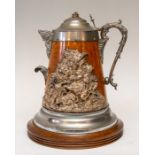A late Victorian oak ceremonial pitcher, circa 1890, nickel and electrotype mounts, hinged cover