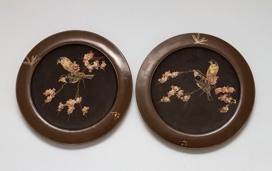 A pair Bretby art pottery bronzed wall plaques with 'cloisonne' decoration of birds on branches