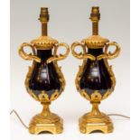 A pair of French ormolu and cobalt blue porcelain table lamps, the ormolu mounts with cast