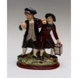 An early nineteenth century Staffordshire group figure of T'he Night Watchmen', circa 1800. The