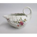 A Derby Leaf moulded Polychrome small Sauce Boat  Painted with floral sprays Date: circa 1758