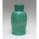 A Susie Cooper Studio pottery baluster vase, matt green glaze with raised horse shoe devices,