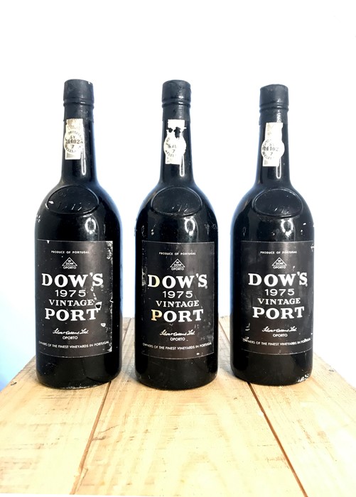 Three bottles of 1975 Dow's Vintage Port. Description: Quantity: 3 bottles Condition: Mixed. Origin: