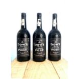 Three bottles of 1975 Dow's Vintage Port. Description: Quantity: 3 bottles Condition: Mixed. Origin: