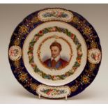 A mid-nineteenth century Sevres-style shaped circular porcelain plate, decorated with a portrait