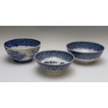 Three early nineteenth century blue and white transfer printed large bowls, circa 1800-10.