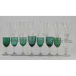 A collection of George III and later wrythen ale glasses, some with knopped stems, of various sizes,