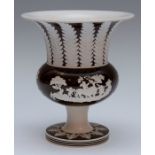 An early nineteenth century feldspathic stoneware thistle-shaped vase, circa 1810-20. It is