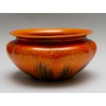 A Pilkington Royal Lancastrian low bowl, mottled orange glaze, No.2772, diameter 23cm