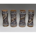 A set of four faience albarello or wet drug jars, 16th Century, each named within a banner, 'Sal