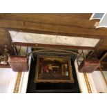A George III brass and oak fire surround, circa 1810, a pair of rectangular leather seats each side,