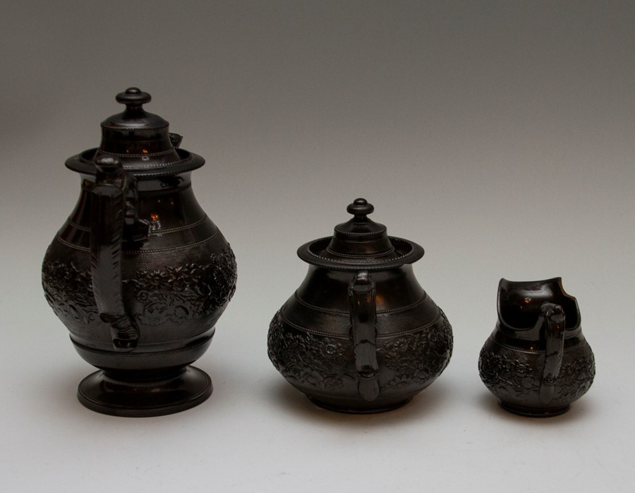 Three pieces of early nineteenth century Jackfield-type wares, circa 1810-30. To include: A low - Image 2 of 5
