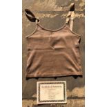 A Cotton 1980s Top in a Mushroom colour with velvet straps that belonged to the artist and