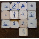 A group of mainly seventeenth century Dutch tin-glazed delftware blue and white hand painted