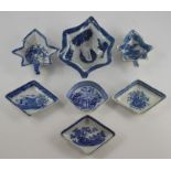 A group of seven early nineteenth century blue and white transfer printed pickle dishes, circa