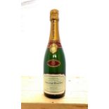 A bottle of Laurent Perrier Champagne Brut L.P, as well as a bottle of Moët & Chandon Brut