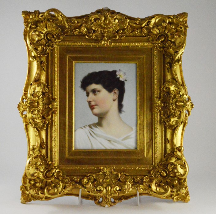 A Berlin porcelain hand painted wall plaque, depicting a young lady in profile view, 16cm x 21cm,