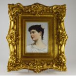 A Berlin porcelain hand painted wall plaque, depicting a young lady in profile view, 16cm x 21cm,