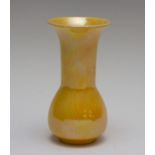 A Ruskin yellow lustre glazed baluster vase, impressed marks and dated 1921, height 15.5cm Generally