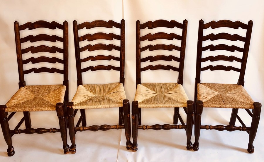 A set of ten early 19th and later century elm rush seated chairs, circa 1810, ladder back with - Image 2 of 2