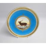 A Mintons Late 19th century Plate painted after Landseer with Stag  under a turquoise and acid
