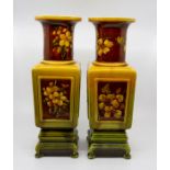 A pair of Bretby art pottery square section baluster vases on integral plinths, No. 665. 37 cm tall.